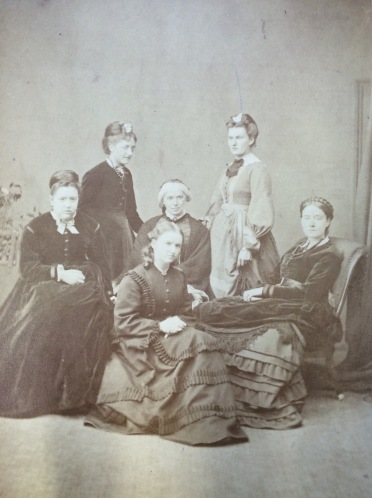 Young Mary at Newnham College 1871 (she is standing at the back in a pale dress). Reproduced with permission of the Marshall Librarian, Marshall Library Archive: Marshall Papers Box 10 (call number 10/7/23)